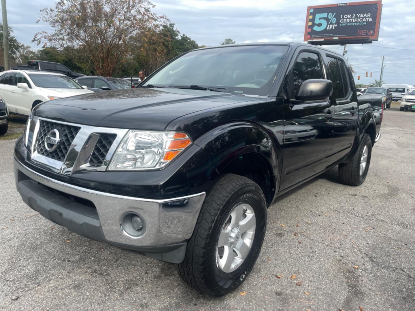 2009 BLACK NISSAN FRONTIER CREW CAB SE (1N6AD07U09C) with an 4.0L engine, Automatic transmission, located at 5103 Dorchester Rd., Charleston, SC, 29418-5607, (843) 767-1122, 36.245171, -115.228050 - Local Trade-in with CD/AUX/Bluetooth, Power Windows, Power Locks, Power Mirrors, Keyless Entry, Alloy Wheels, Bedliner, Tow Package. Clean CarFax (no accidents reported!) 209k miles Located at New Life Auto Sales! 2023 WINNER for Post & Courier's Charleston's Choice Pre-owned Car Dealer AND 2018-2 - Photo#2